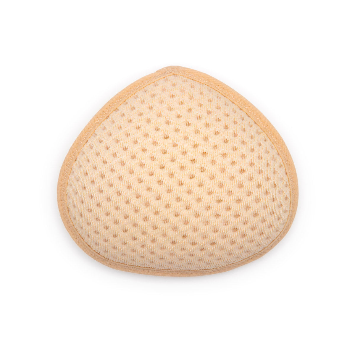 Beige triangular sleep breast forms pair with textured perforated fabric surface and stitched edges