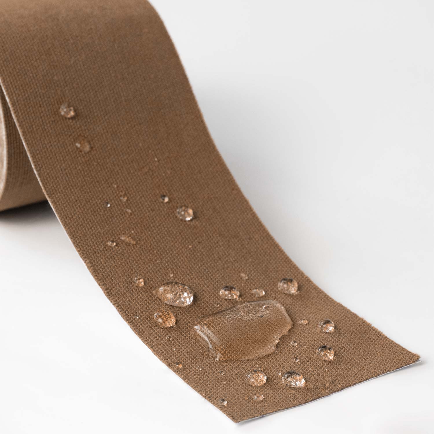 3-inch brown woven binding tape with water-repellent beading droplets