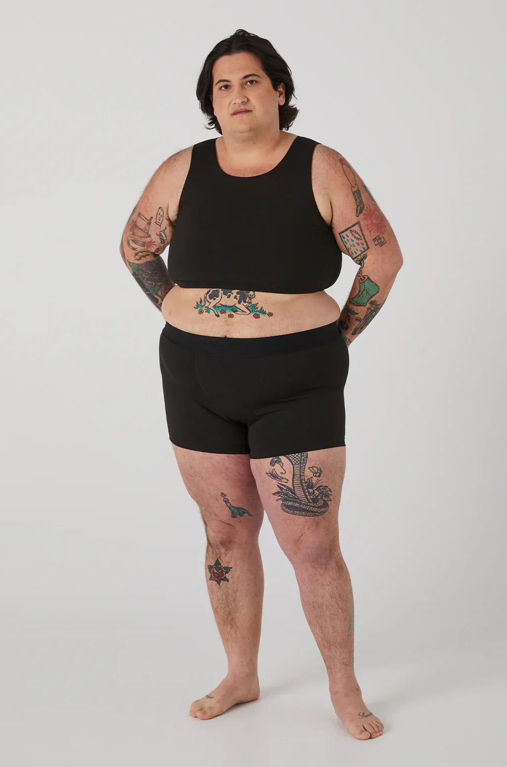 Black sleeveless crop top with rounded neckline in Compression Short