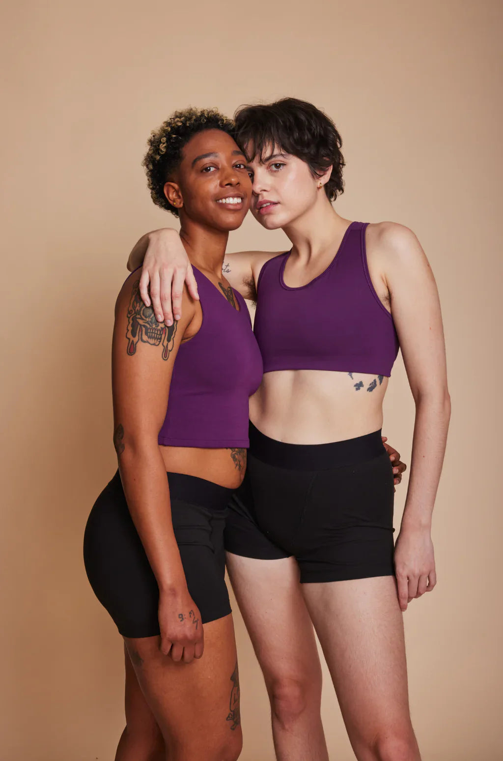 Purple racerback sports bra in seamless compression short design