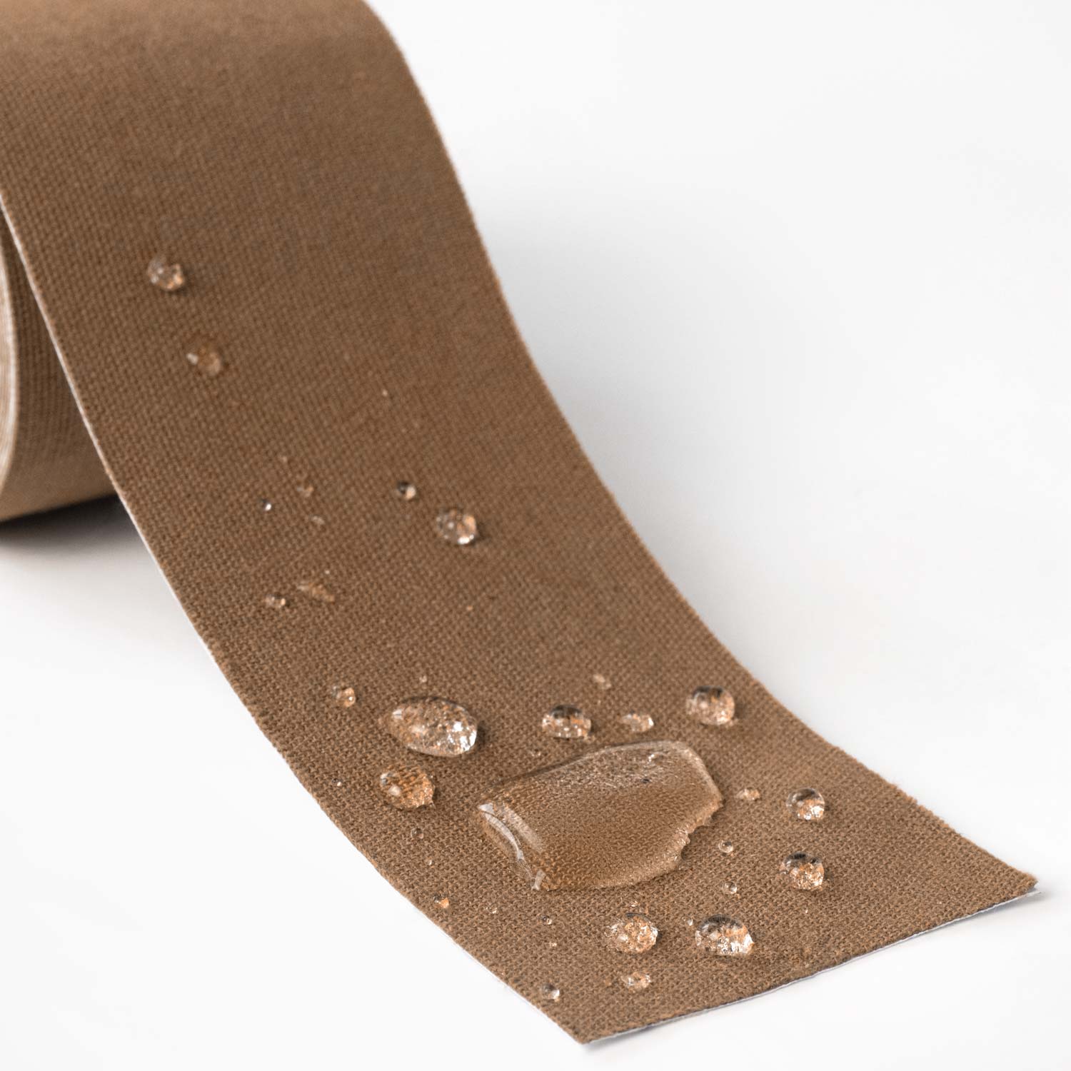 5 inch brown textured binding tape with water-resistant surface showing droplets beading on fabric