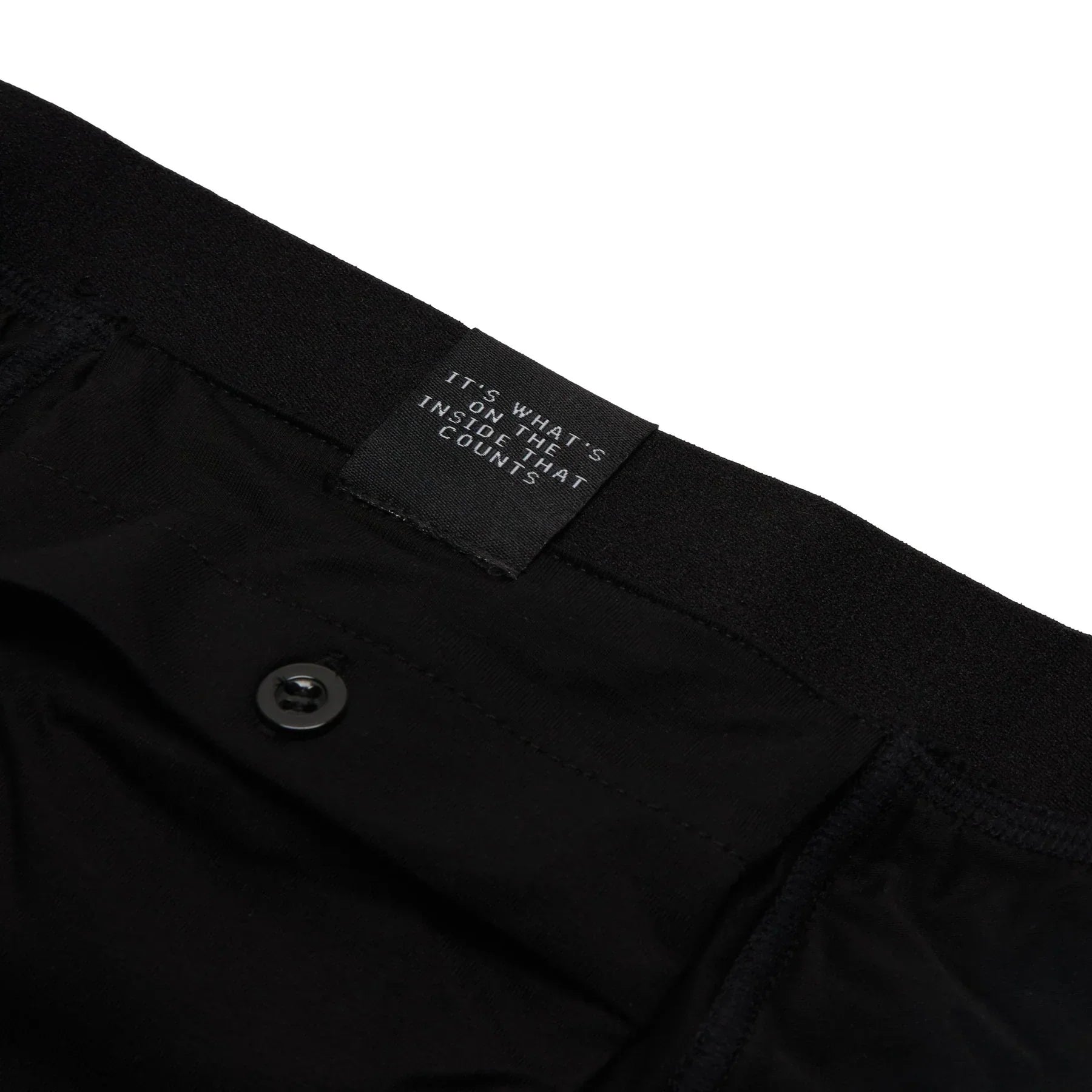 Black All-In-One Packing Boxers: sleek pants with inside label motto