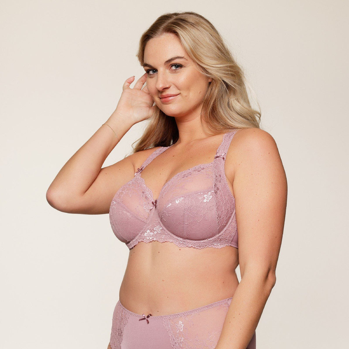 Delicate lavender lace bra with floral embroidery and satin straps