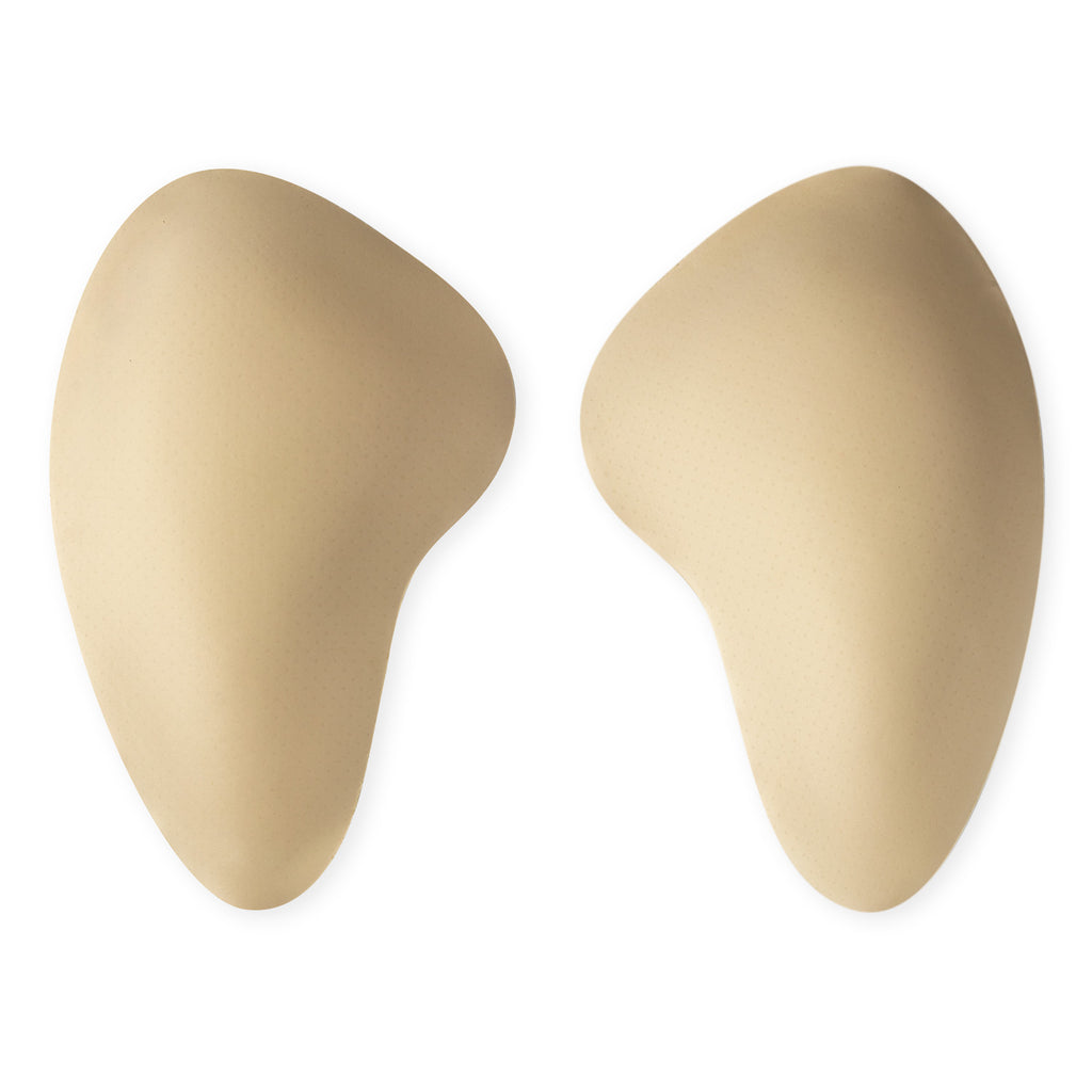 A pair of beige hip pads