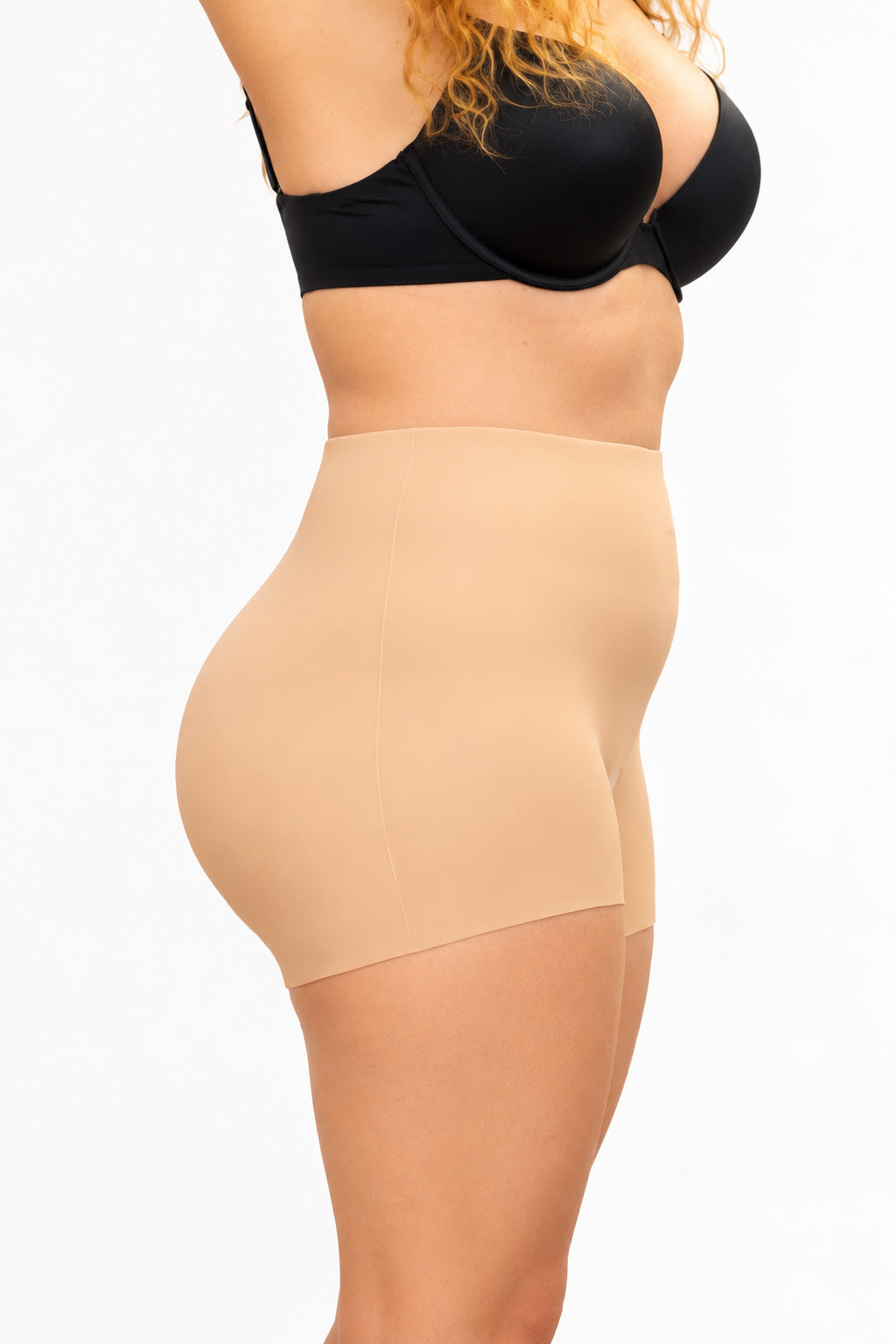 Beige high-waisted seamless silicone butt padding shorts shown from the back for enhanced shape and comfort